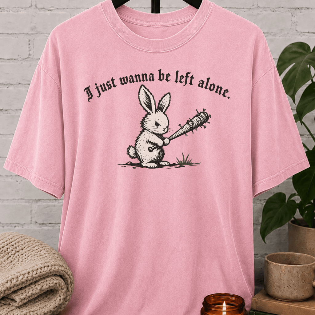 Funny leave me alone bunny T-shirt featuring a rabbit holding a spiked bat and the phrase “I Just Wanna Be Left Alone,” with antisocial introvert humor.