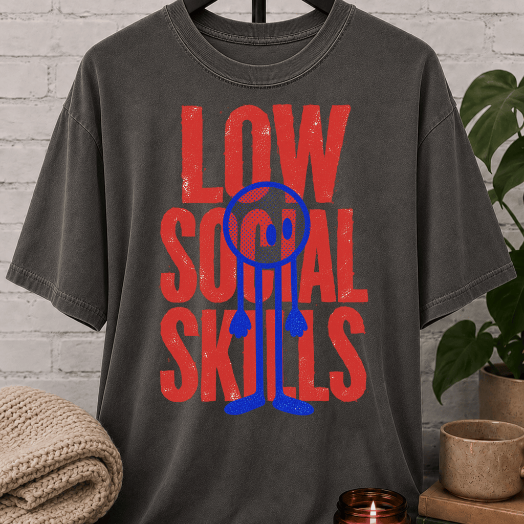 Low Social Skills graphic T-shirt featuring a distressed deadpan face design, a funny socially awkward shirt for awkward humor fans and people who avoid unnecessary socializing.