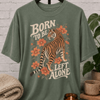 Antisocial tiger graphic T-shirt featuring a vintage floral tiger illustration and the phrase “Born to Be Left Alone,” a funny loner shirt for introverts, solitude lovers, and people who prefer their own company.