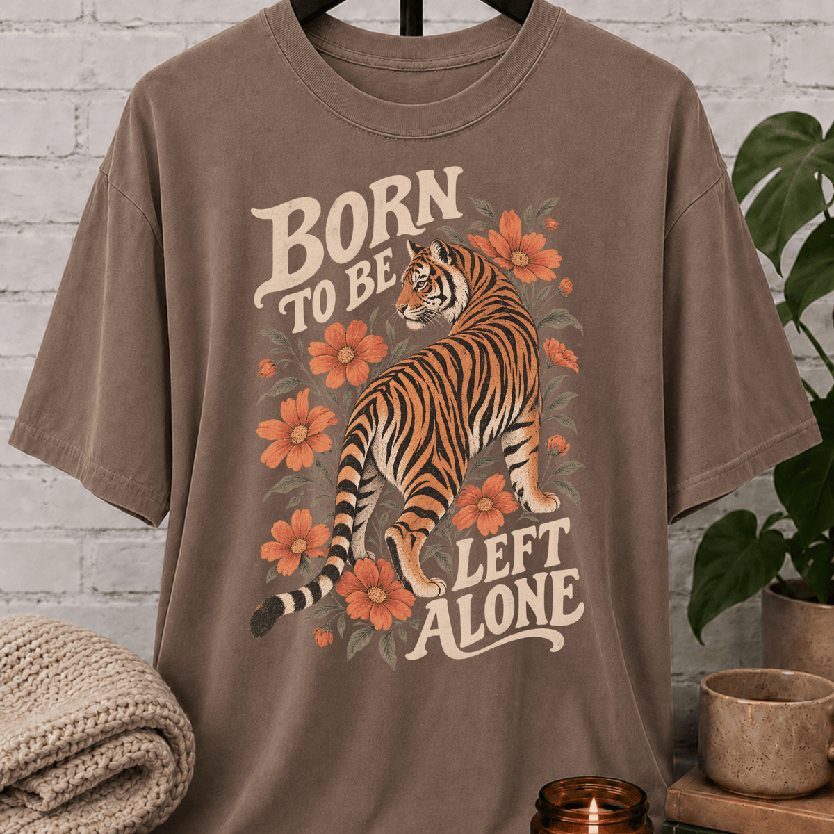 Antisocial tiger graphic T-shirt featuring a vintage floral tiger illustration and the phrase “Born to Be Left Alone,” a funny loner shirt for introverts, solitude lovers, and people who prefer their own company.