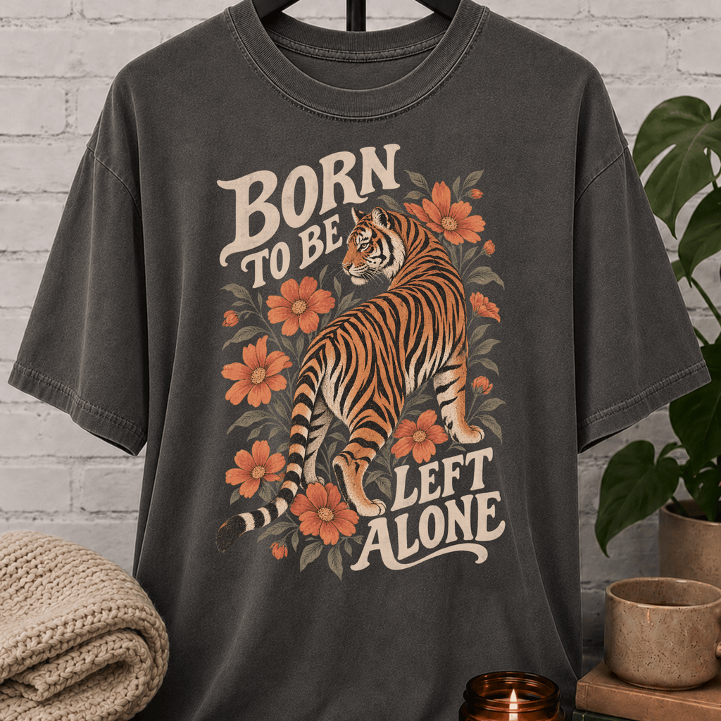 Antisocial tiger graphic T-shirt featuring a vintage floral tiger illustration and the phrase “Born to Be Left Alone,” a funny loner shirt for introverts, solitude lovers, and people who prefer their own company.