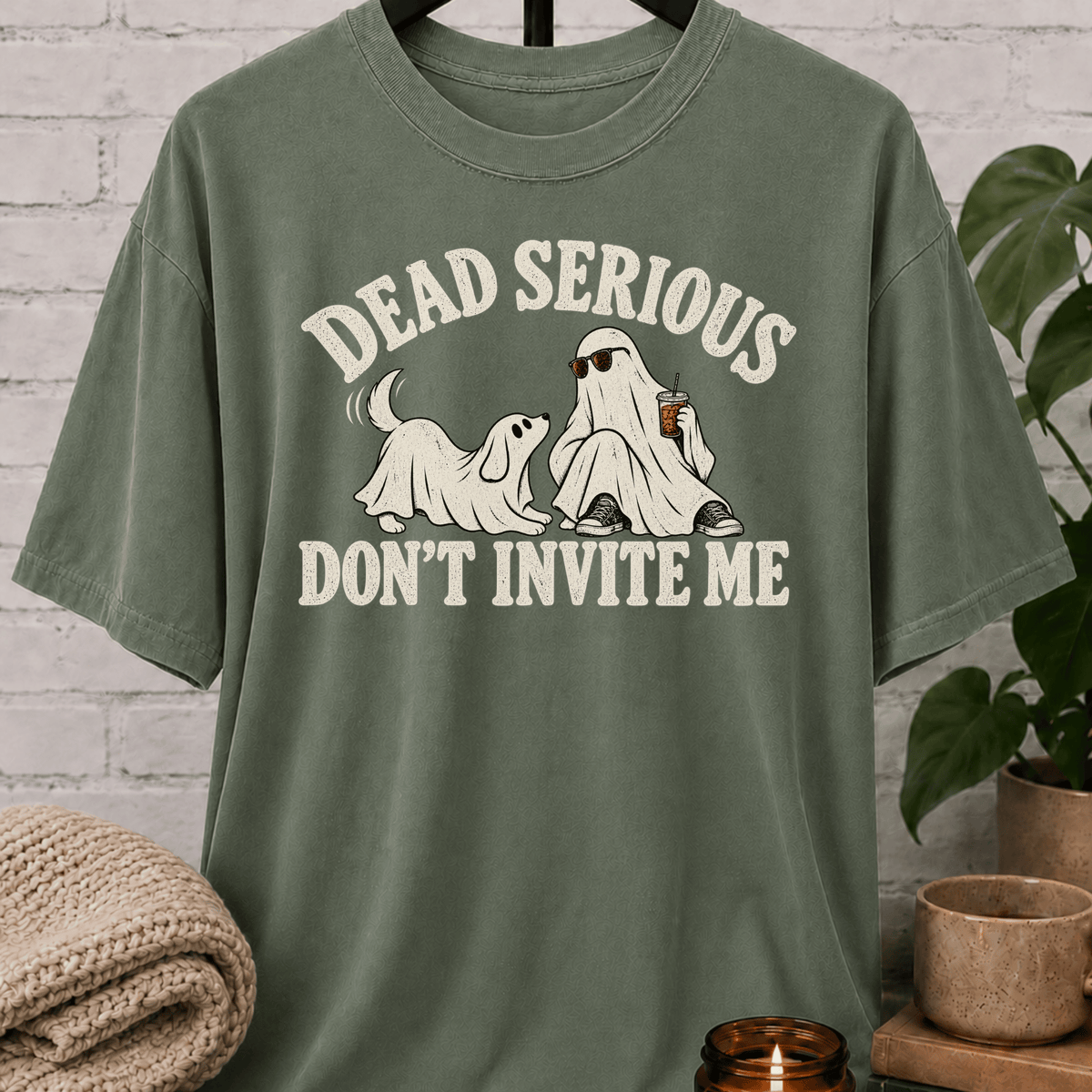 Funny Halloween ghost T-shirt featuring two sheet ghosts and the phrase “Dead Serious Don’t Invite Me,” a spooky season graphic tee with sarcastic antisocial humor for people who would rather skip the party.