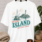 Solitude Island nautical T-shirt featuring a vintage fishing boat, lighthouse, rocky coastline, and the phrase “Don’t Come Ashore,” a loner graphic tee for solitude lovers and people who prefer being left alone.