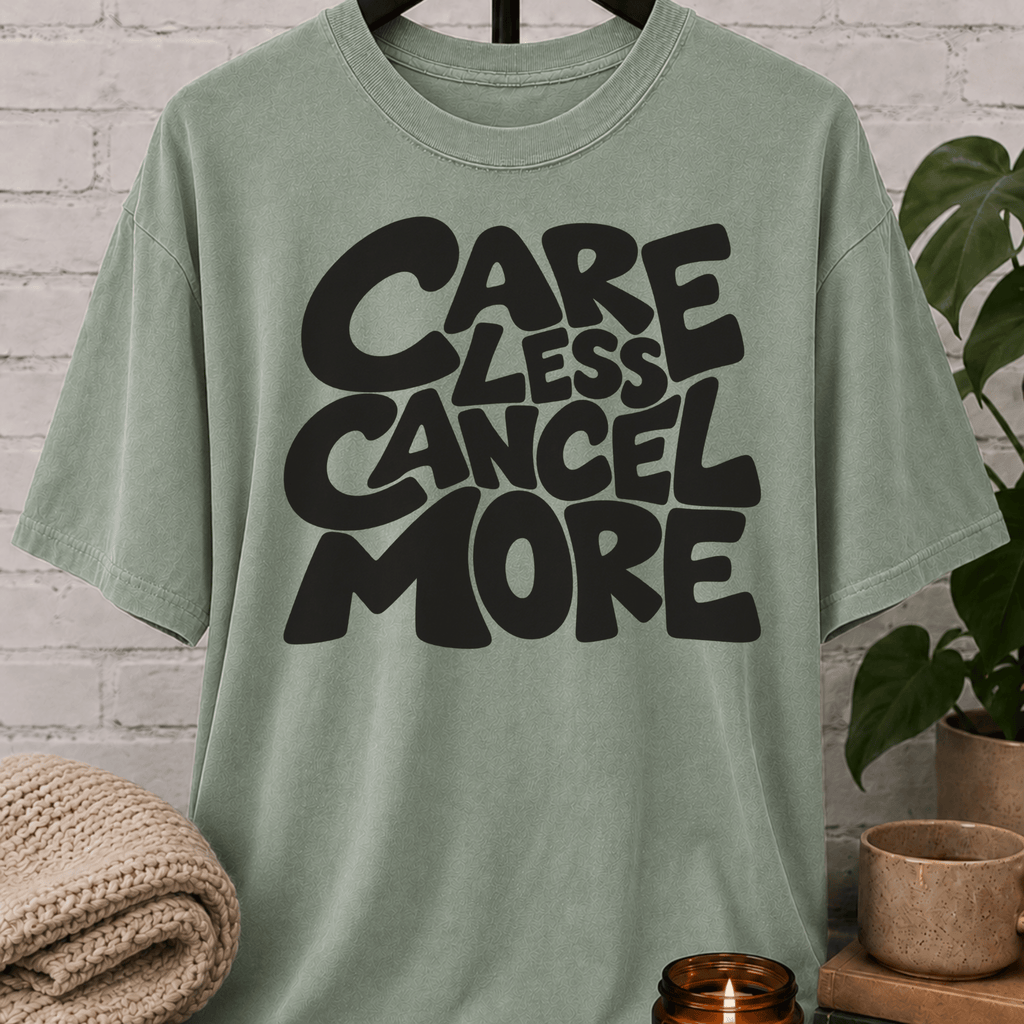 Sarcastic graphic T-shirt featuring the phrase “Care Less Cancel More,” a humorous cancel plans shirt for socially selective people, homebodies, and fans of antisocial humor.