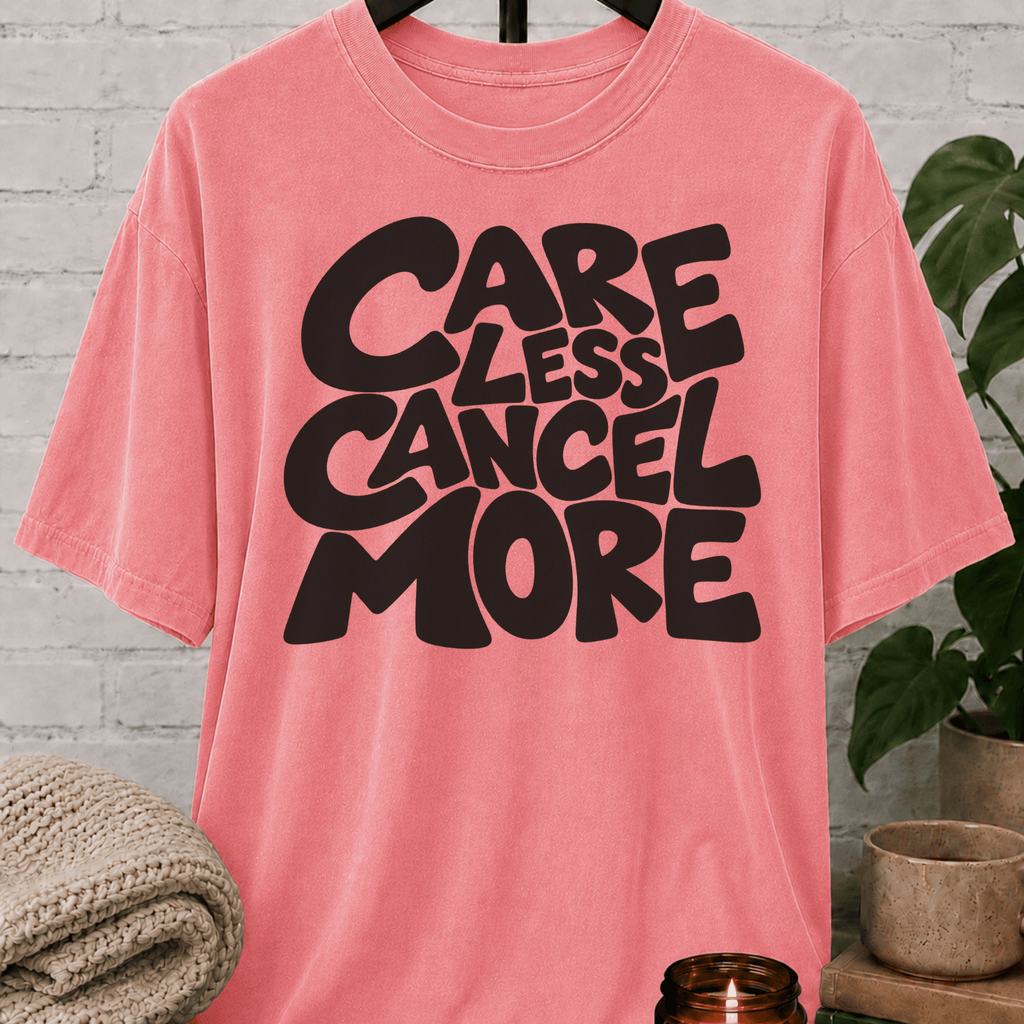 Sarcastic graphic T-shirt featuring the phrase “Care Less Cancel More,” a humorous cancel plans shirt for socially selective people, homebodies, and fans of antisocial humor.