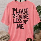 Overwhelmed humor graphic T-shirt featuring the bold phrase “Please Require Less of Me,” a sarcastic low social battery shirt for overthinkers, socially drained people, and anyone with limited bandwidth.
