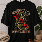 Socially awkward snake graphic T-shirt featuring a coiled green snake, red roses, and the phrase “People Skills Results May Vary,” a sarcastic graphic tee for awkward humor fans and socially selective personalities.