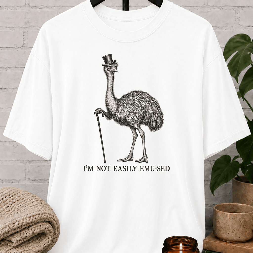 Sarcastic emu graphic T-shirt featuring a vintage emu wearing a top hat and holding a cane with the phrase “I’m Not Easily Emu-sed,” a quirky animal humor shirt for socially selective and hard-to-impress people.