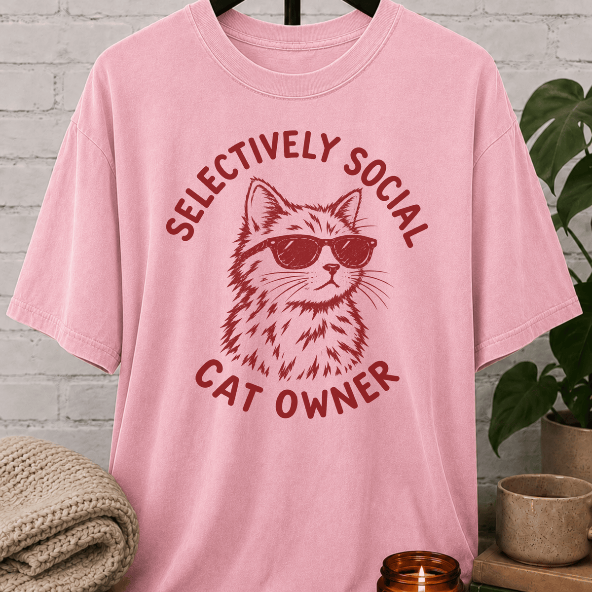 Cat lover graphic T-shirt featuring a cat wearing sunglasses with the phrase “Selectively Social Cat Owner,” a sarcastic cat shirt for socially selective people, cat owners, and feline humor fans.