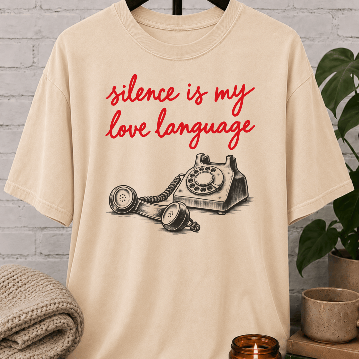 Low social battery graphic T-shirt featuring a vintage rotary telephone and the phrase “Silence Is My Love Language,” a retro solitude shirt for socially selective people and fans of less talking.