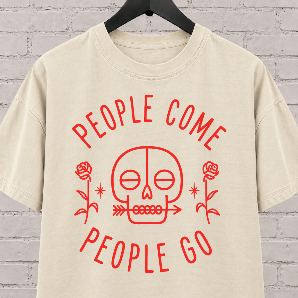 People Come People Go skull graphic T-shirt featuring a minimalist skull, roses, and arrow detail, an antisocial graphic tee for socially selective people, loners, and dark humor fans.