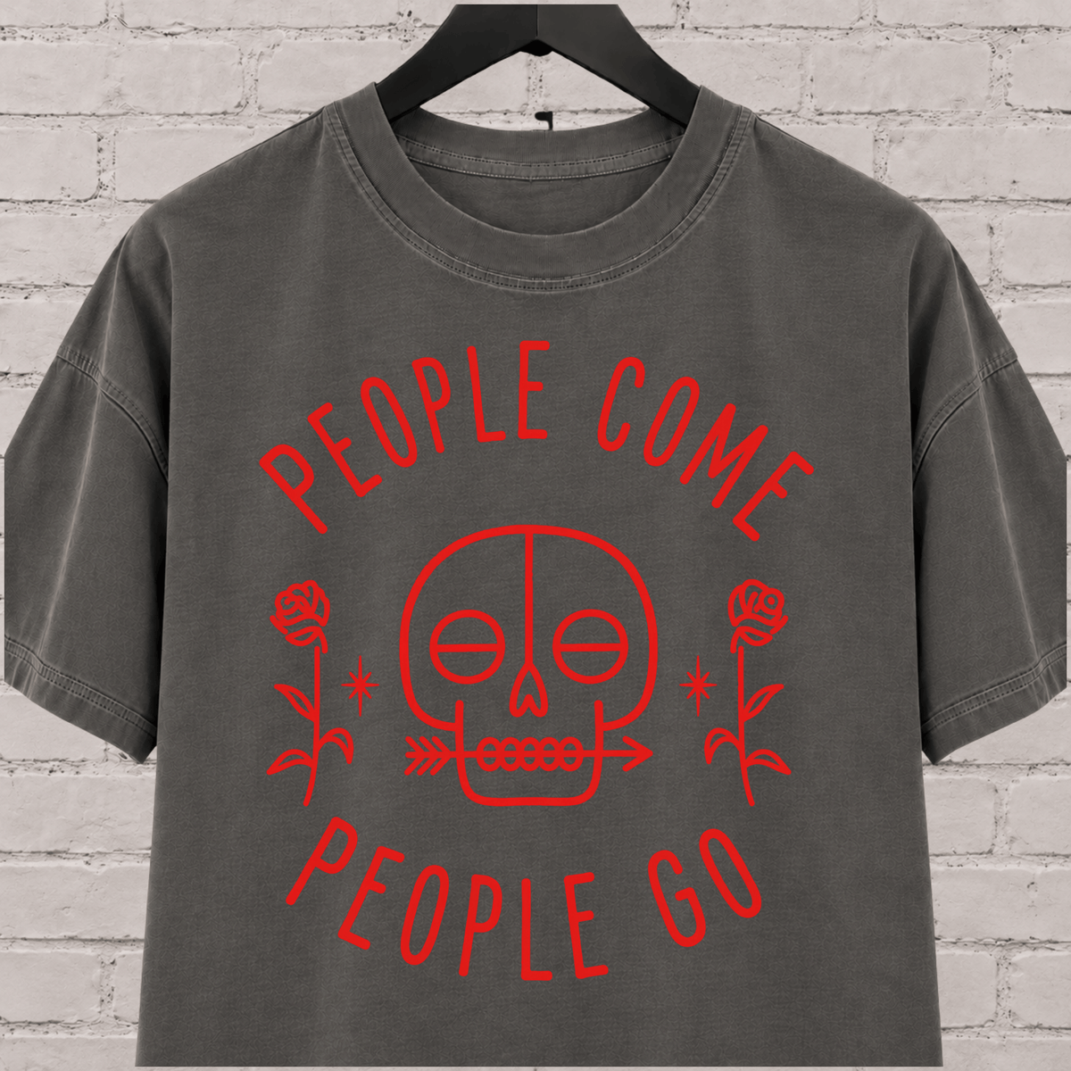 People Come People Go skull graphic T-shirt featuring a minimalist skull, roses, and arrow detail, an antisocial graphic tee for socially selective people, loners, and dark humor fans.