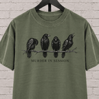 Murder in Session crow graphic T-shirt featuring four black crows perched on a branch, a dark humor raven and crow shirt for socially selective people, bird lovers, and gothic humor fans.