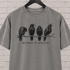 Murder in Session crow graphic T-shirt featuring four black crows perched on a branch, a dark humor raven and crow shirt for socially selective people, bird lovers, and gothic humor fans.