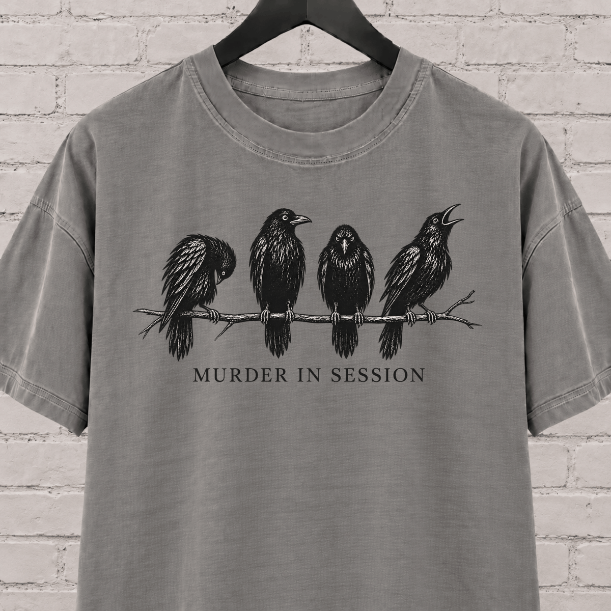 Murder in Session crow graphic T-shirt featuring four black crows perched on a branch, a dark humor raven and crow shirt for socially selective people, bird lovers, and gothic humor fans.