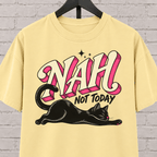 Nah Not Today black cat graphic T-shirt featuring a stretching black cat with bold retro lettering, an antisocial cat shirt for socially selective people, plan avoiders, and cat lovers who prefer staying in.
