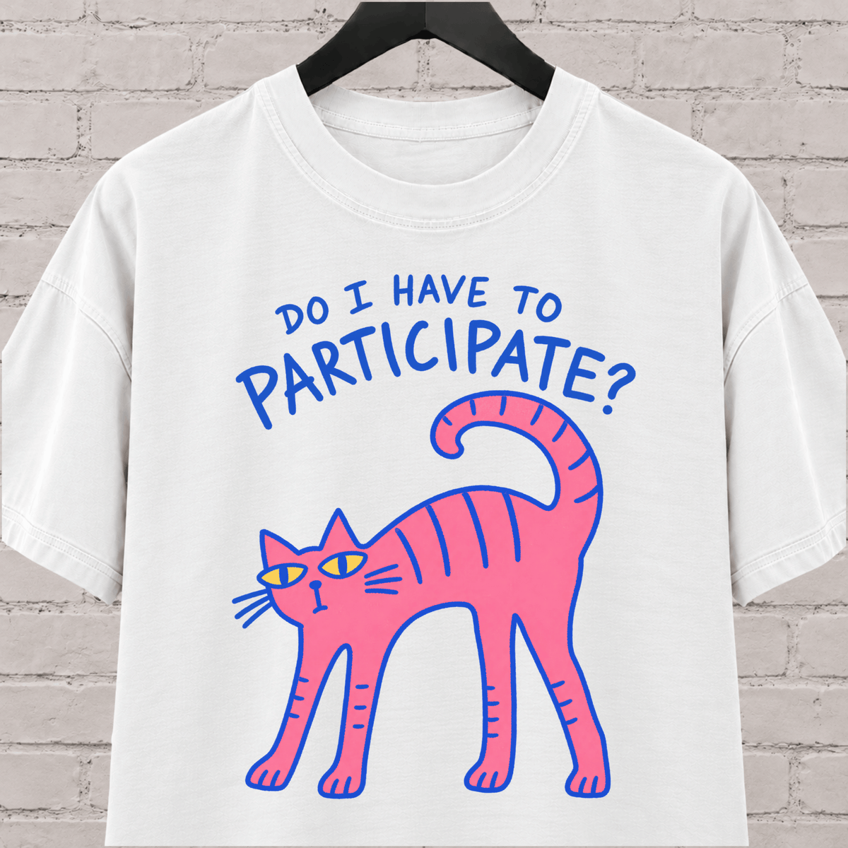 Do I Have to Participate cat graphic T-shirt featuring an unimpressed pink cat, an introvert humor shirt for reluctant socializers and group activity avoiders.
