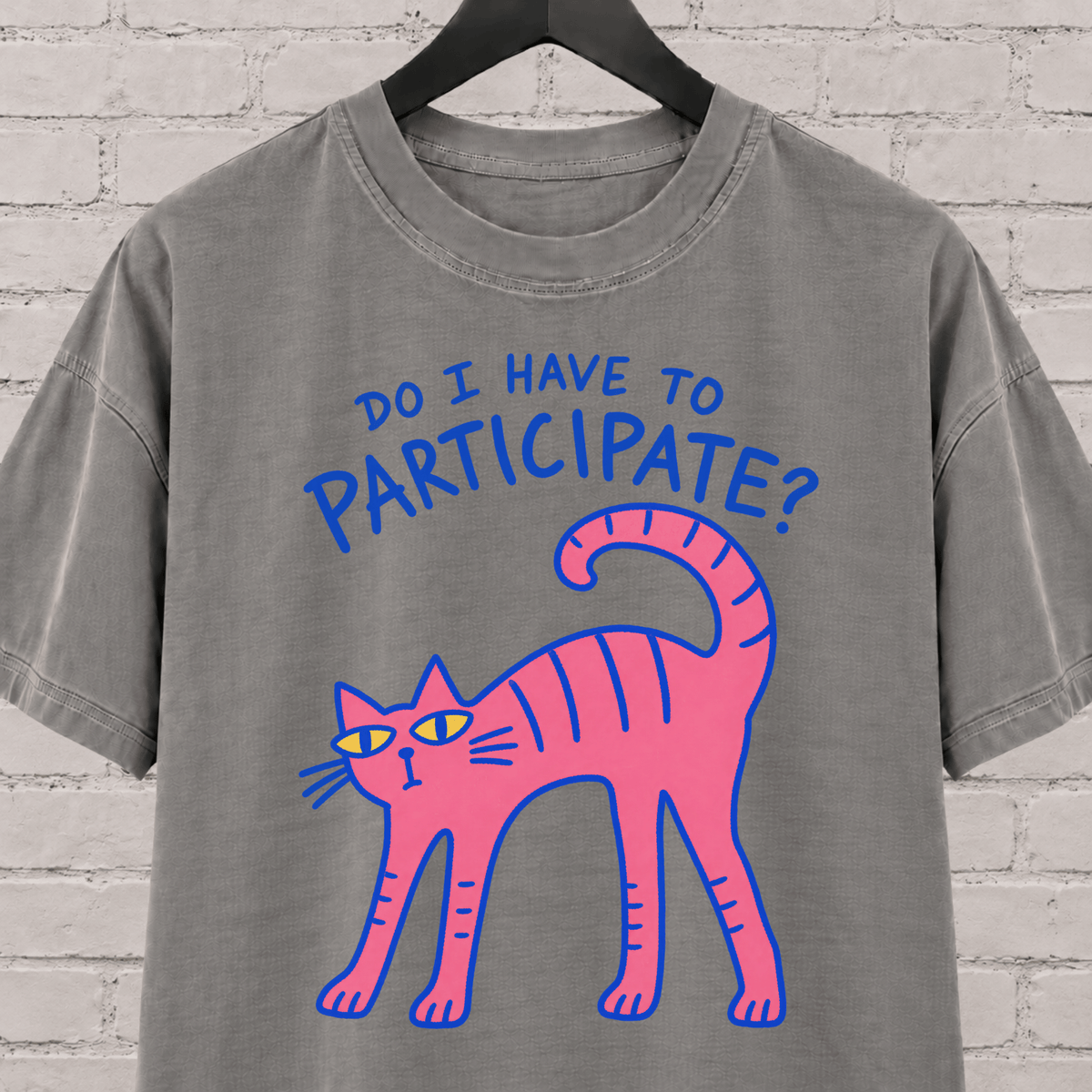 Do I Have to Participate cat graphic T-shirt featuring an unimpressed pink cat, an introvert humor shirt for reluctant socializers and group activity avoiders.