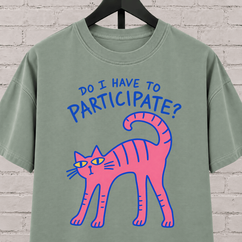 Do I Have to Participate cat graphic T-shirt featuring an unimpressed pink cat, an introvert humor shirt for reluctant socializers and group activity avoiders.