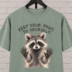 Keep Your Paws to Yourself raccoon graphic T-shirt featuring a raccoon with raised paws, an antisocial personal space shirt.