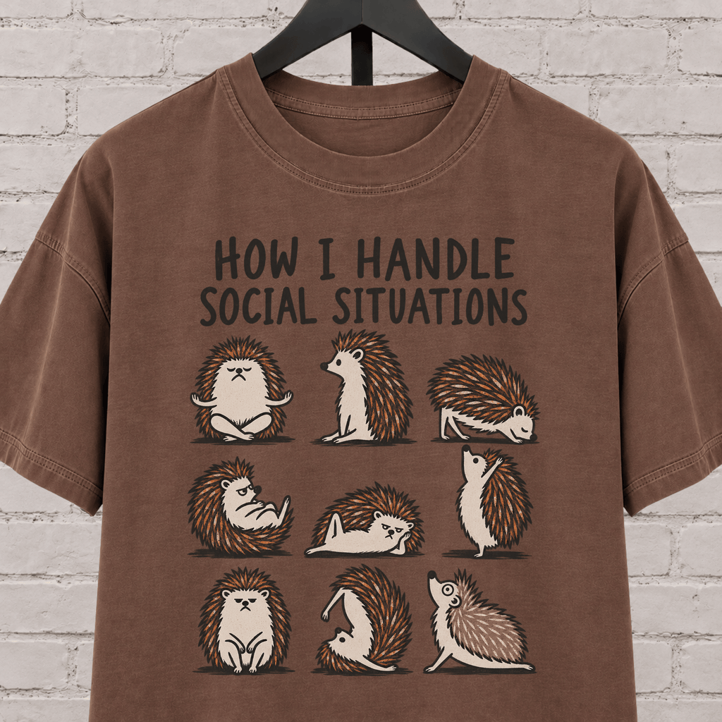 Socially awkward hedgehog graphic T-shirt featuring nine illustrated hedgehogs in different poses with the phrase “How I Handle Social Situations.”