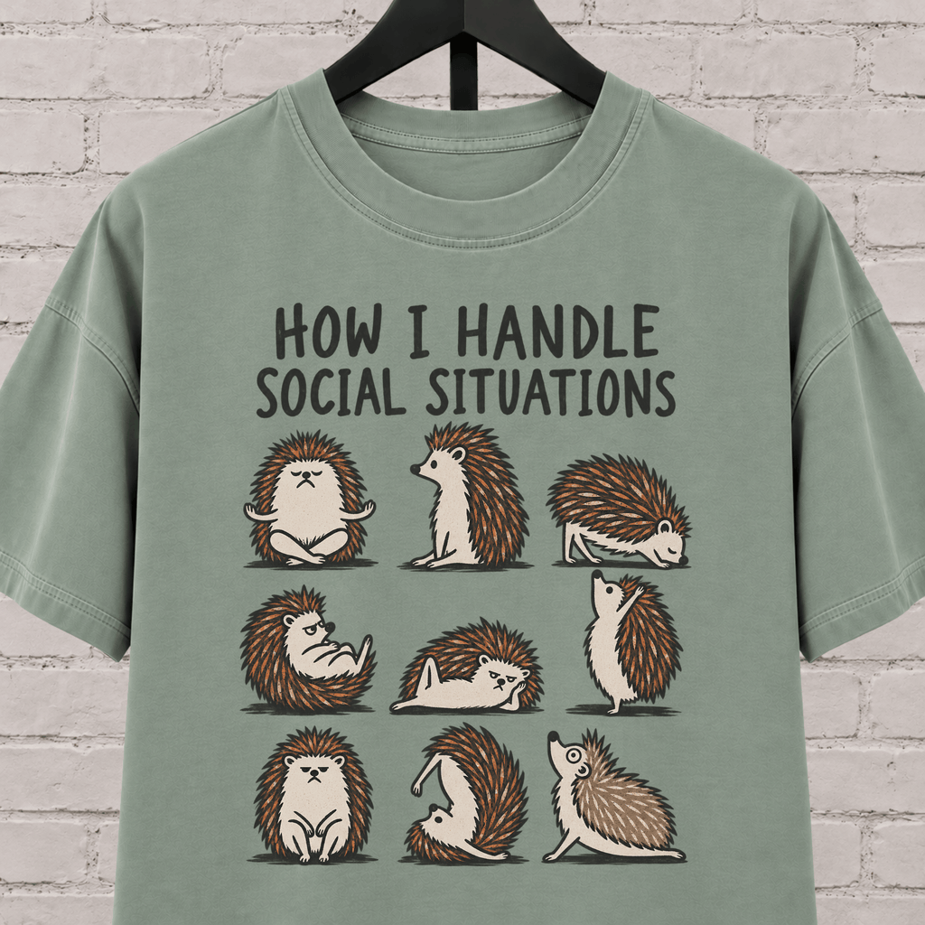 Socially awkward hedgehog graphic T-shirt featuring nine illustrated hedgehogs in different poses with the phrase “How I Handle Social Situations.”