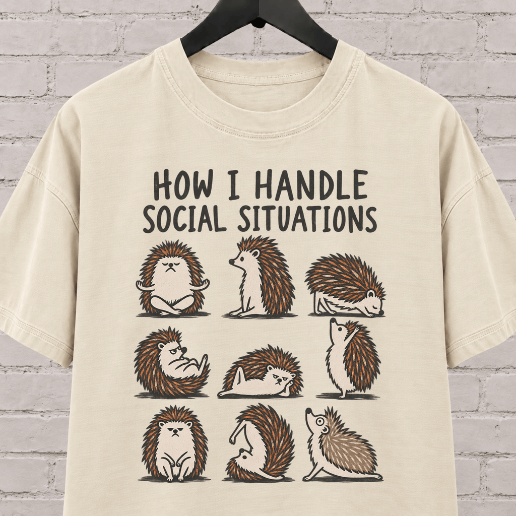 Socially awkward hedgehog graphic T-shirt featuring nine illustrated hedgehogs in different poses with the phrase “How I Handle Social Situations.”