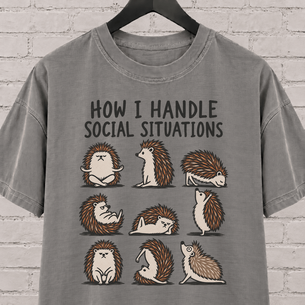 Socially awkward hedgehog graphic T-shirt featuring nine illustrated hedgehogs in different poses with the phrase “How I Handle Social Situations.”